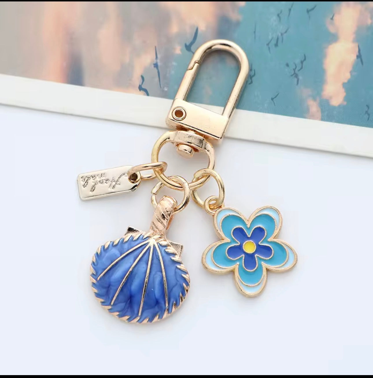 Coquillage bleu pendentif ou porte clé